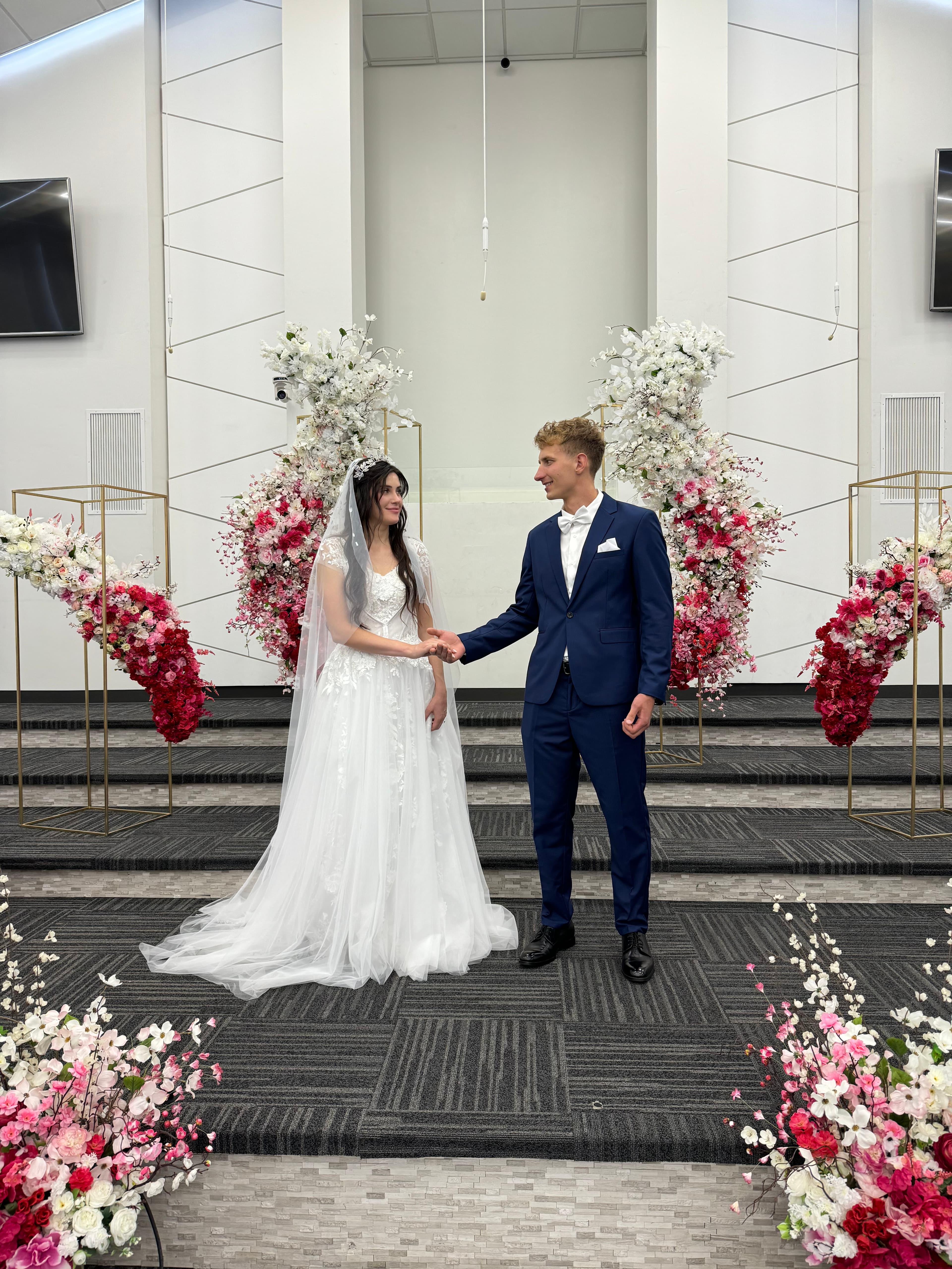 Elegant wedding with bride and groom on stairs